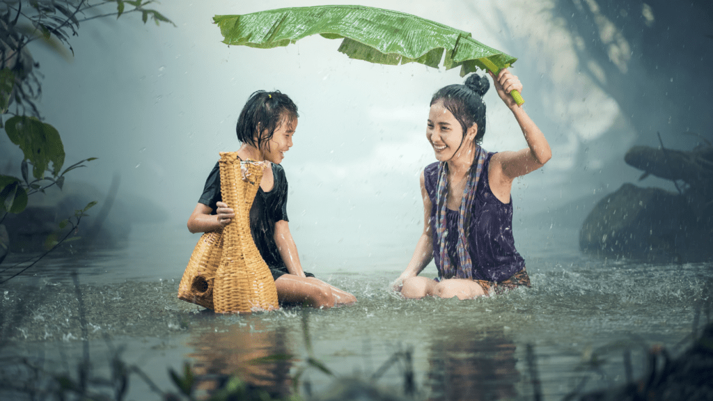 a child playing in the rain